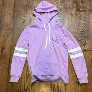 Purple sweater with white stripes a planet, stars, and strings to adjust